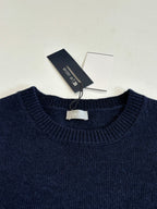 Navy crewneck knit sweater with Dior-branded tag at collar
