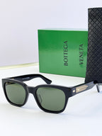 Bottega Veneta sunglasses with black frame and dark green-gray lenses