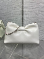 Ivory leather Dior bow handbag with chain shoulder strap and knot front