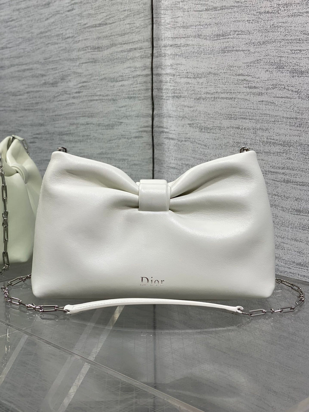 Ivory leather Dior bow handbag with top handle and chain shoulder strap