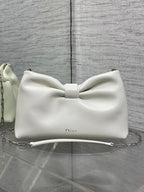 Ivory leather Dior bow handbag with top handle and chain shoulder strap