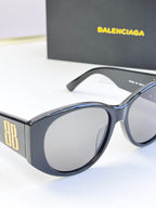 Navy acetate sunglasses with large round lenses and gold 8B emblem