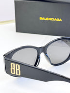 Dark blue acetate sunglasses with round lenses and gold 8B logo