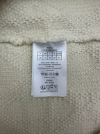 Cream Dior jacket size and care label stitched inside collar