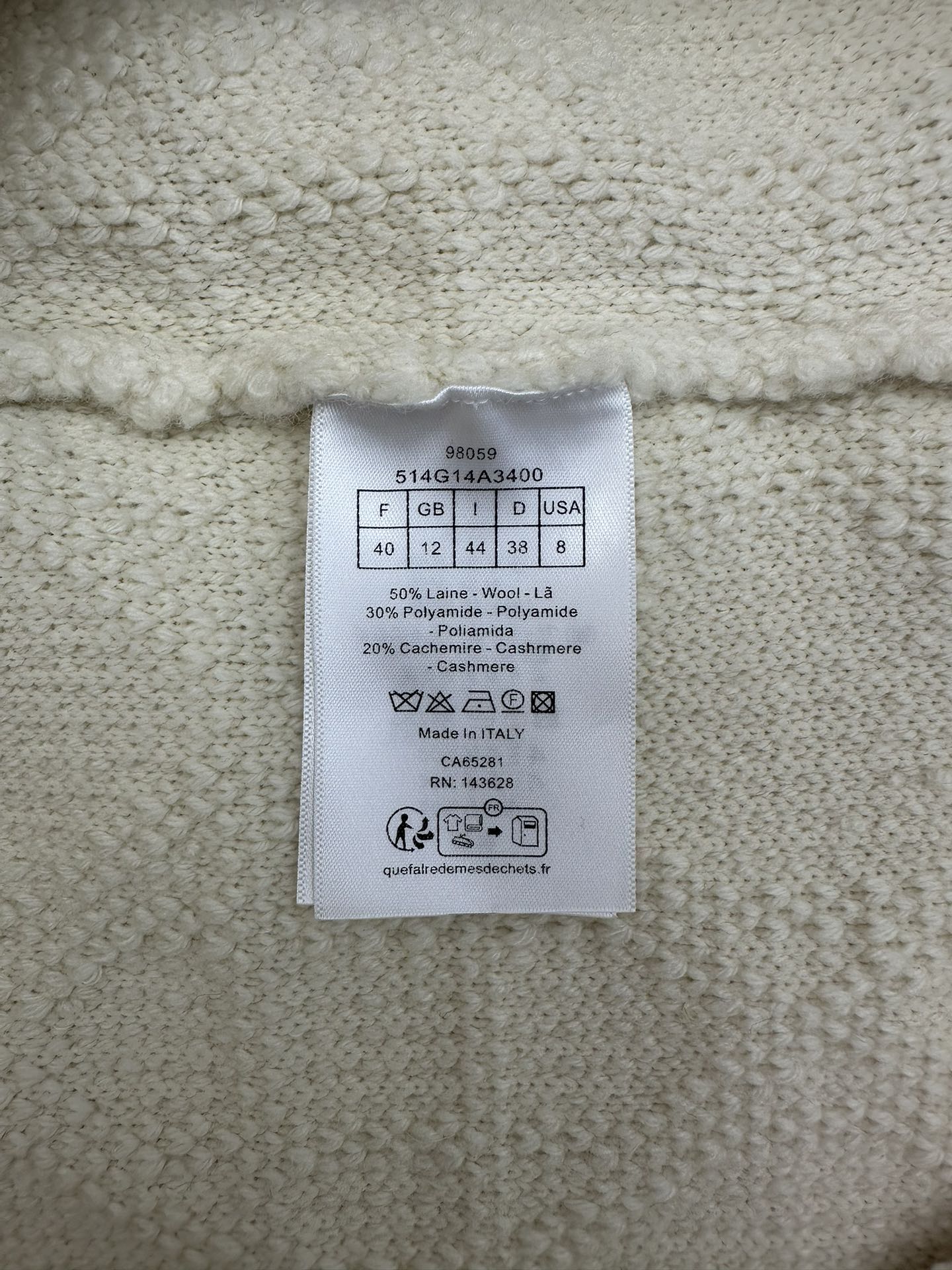 Cream Dior jacket size and care label stitched inside collar