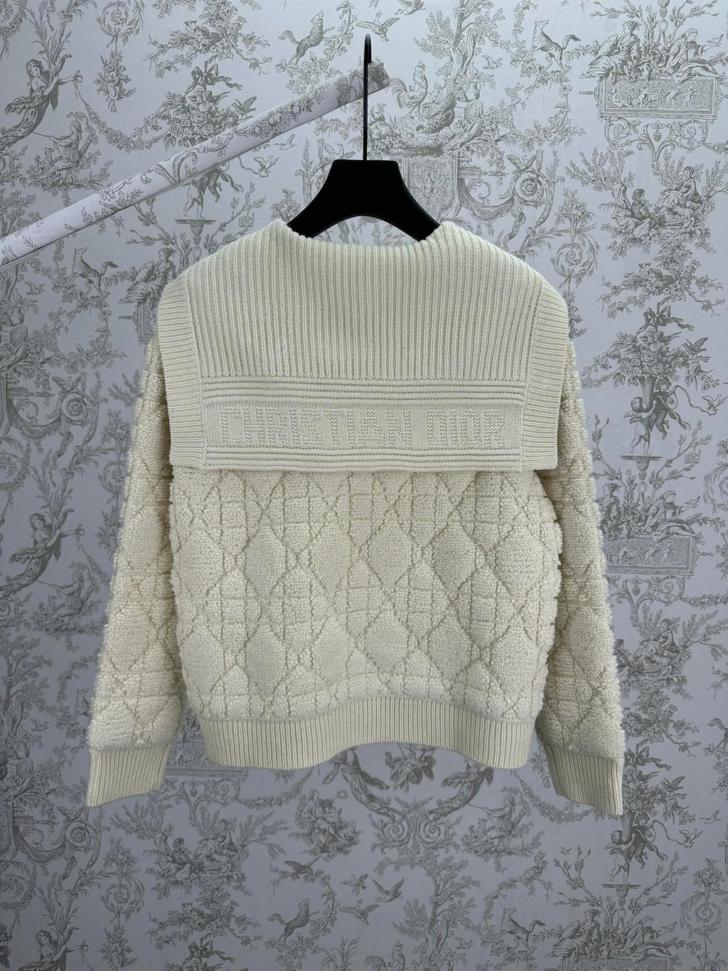 Cream knit Dior hooded jacket with ribbed back yoke and quilted diamond pattern