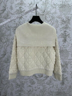 Cream knit Dior hooded jacket with ribbed back yoke and quilted diamond pattern