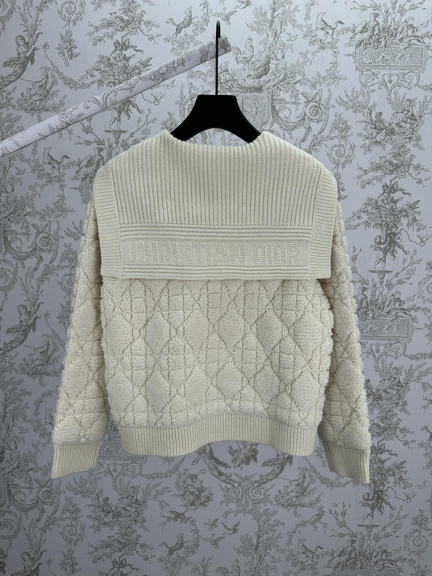 Cream knit Dior hooded jacket with ribbed back yoke and quilted diamond pattern