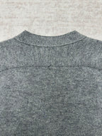 Gucci gray knit cardigan back neckline close-up with ribbed collar and seam detail
