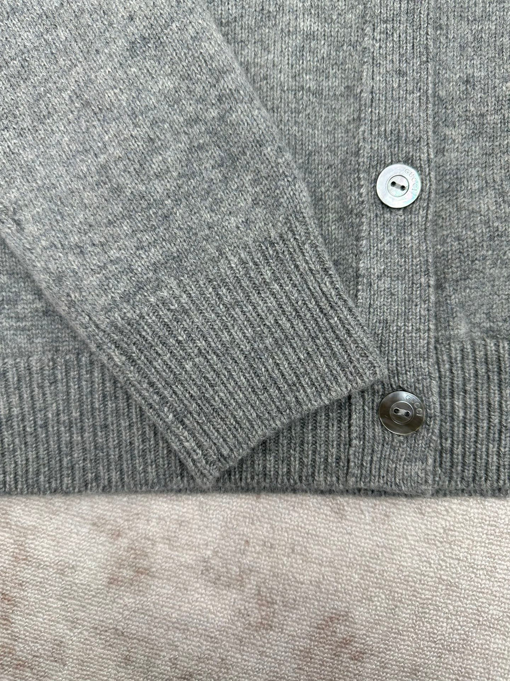 Gucci gray knit cardigan cuff and button detail with ribbed sleeve hem