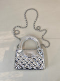 Chanel silver quilted mini bag with top handle and chain shoulder strap