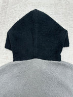 Balenciaga knit hooded zip sweater with dark navy top and gray lower body