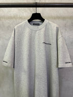 Heather gray crewneck T-shirt with small chest logo; short sleeves