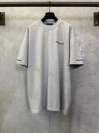 Heather gray crewneck T-shirt with small Chrome Hearts logo on chest