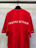 Red short-sleeve T-shirt with large back “Chrome Hearts” graphic.