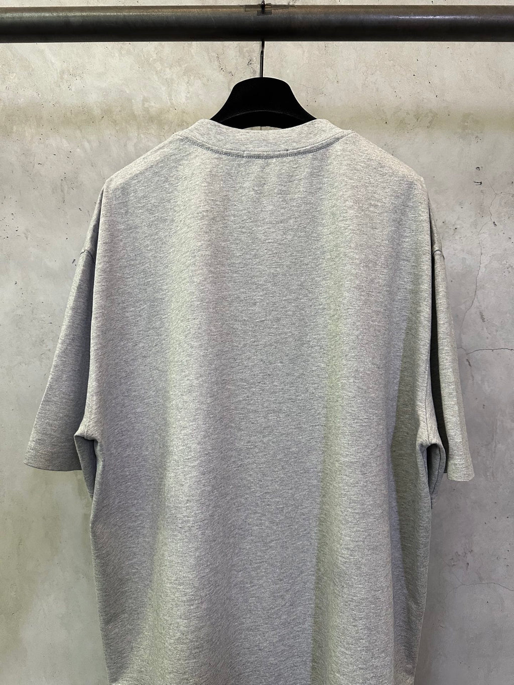 Heather gray T-shirt back view with crew neck and short sleeves