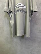 Light sage short-sleeve T-shirt back view with oversized balenciaga logo print