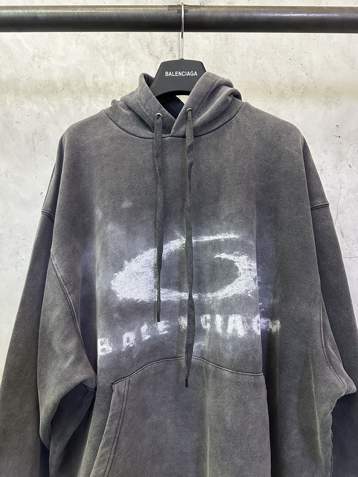 Balenciaga gray hoodie with hood, drawstring, and large distressed chest print