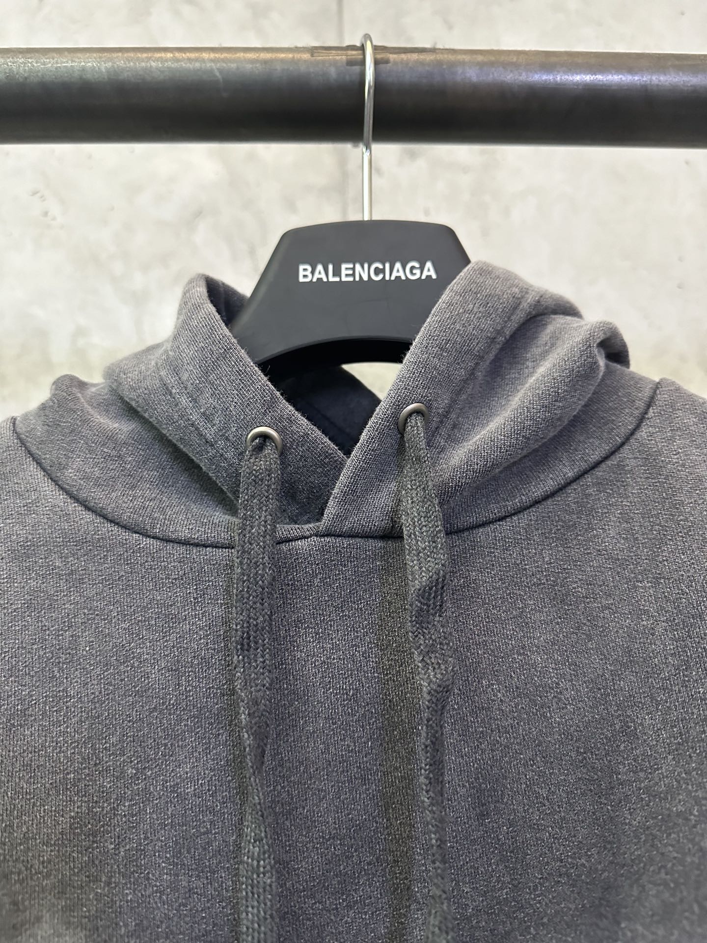 Balenciaga gray hoodie neckline with hood and lace-up drawstring