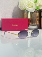 Round sunglasses with purple-tinted lenses and gold-tone metal frame