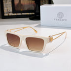 White square sunglasses with brown-tinted lenses and gold-tone arms