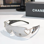 Silver heart-accent sunglasses with dark frames and tinted lenses