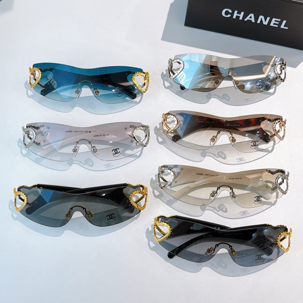Set of six heart-accent sunglasses in blue, clear, black, and tortoiseshell frames