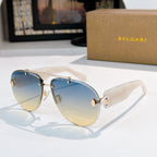 Bvlgari sunglasses with silver frame, blue gradient lenses, pale temples with gold hardware