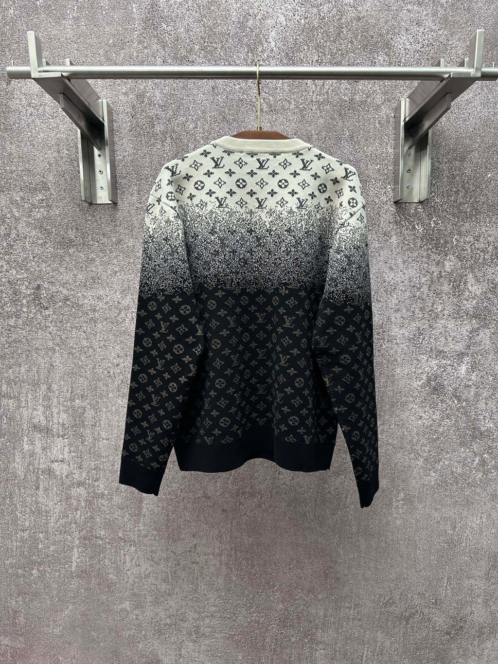 Back view knit sweater with LV monogram pattern, light gray shoulders and dark navy body