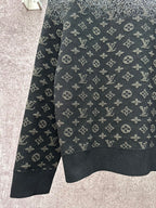 Knit sweater side view with LV monogram pattern, dark navy with scattered speckles