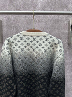 Back of knit sweater with LV monogram pattern, light gray upper and dark navy lower