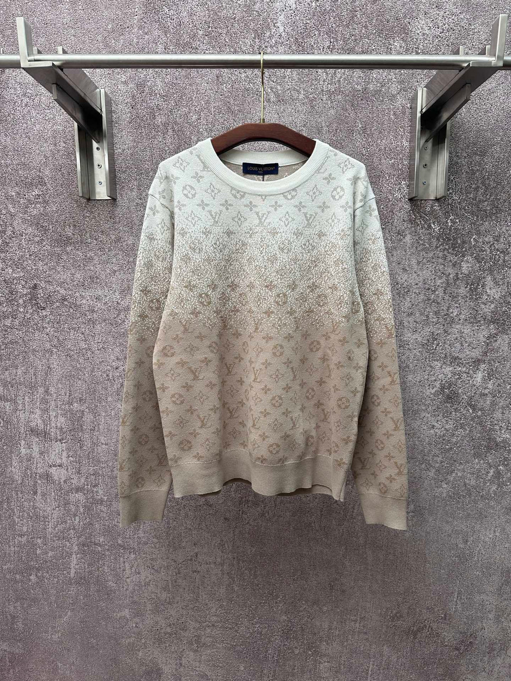 Light beige long-sleeve sweatshirt with allover monogram pattern and crew neck