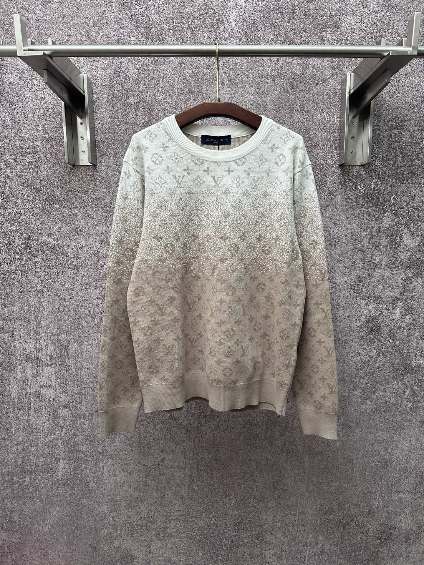 Light beige long-sleeve sweatshirt with allover monogram pattern and crew neck