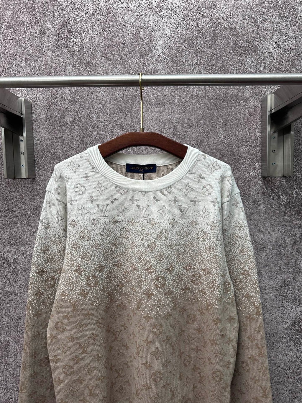 Light beige long-sleeve crewneck sweatshirt with allover monogram print