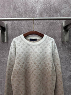 Light beige long-sleeve crewneck sweatshirt with allover monogram print