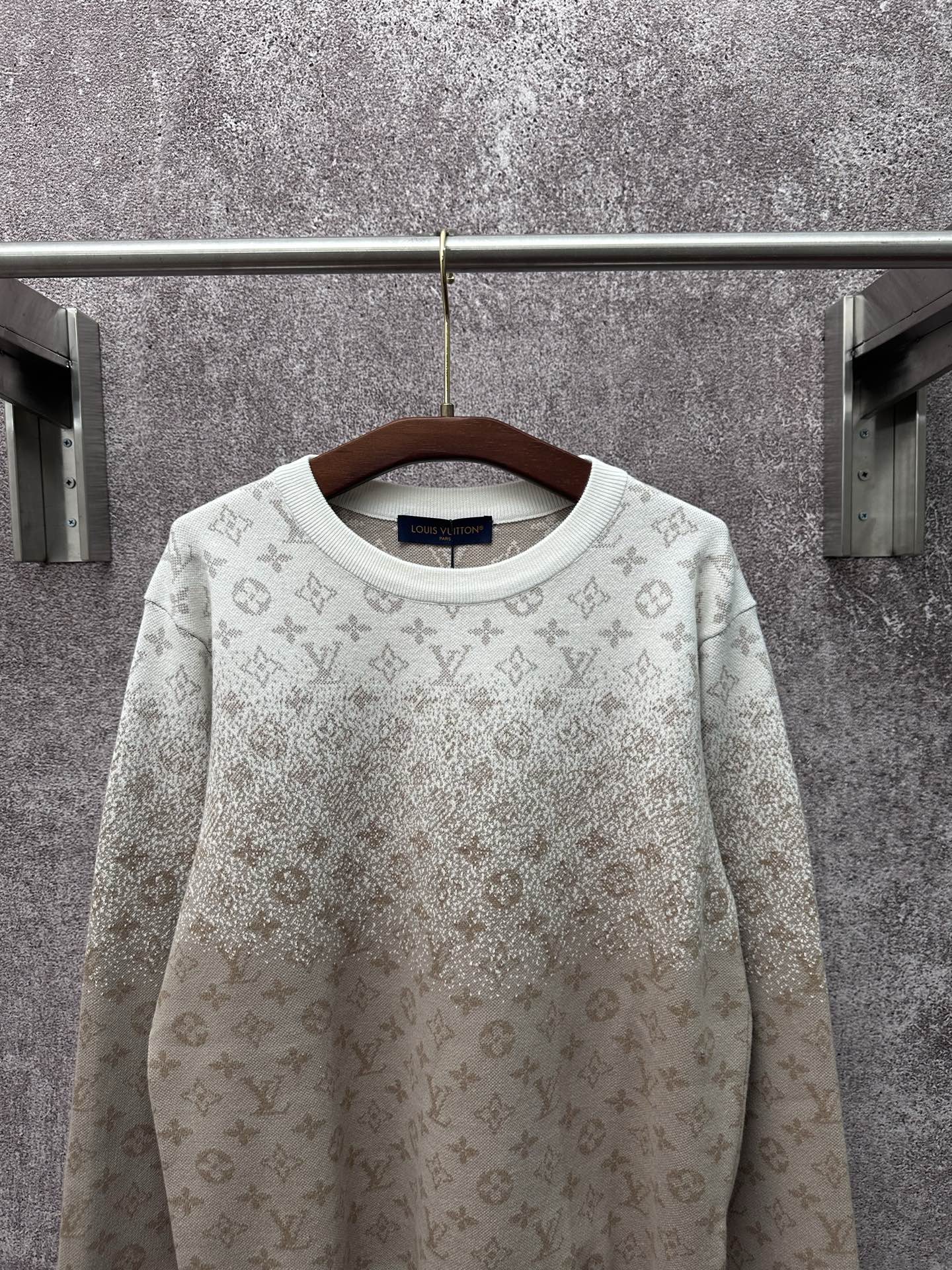 Light beige long-sleeve crewneck sweatshirt with allover monogram print