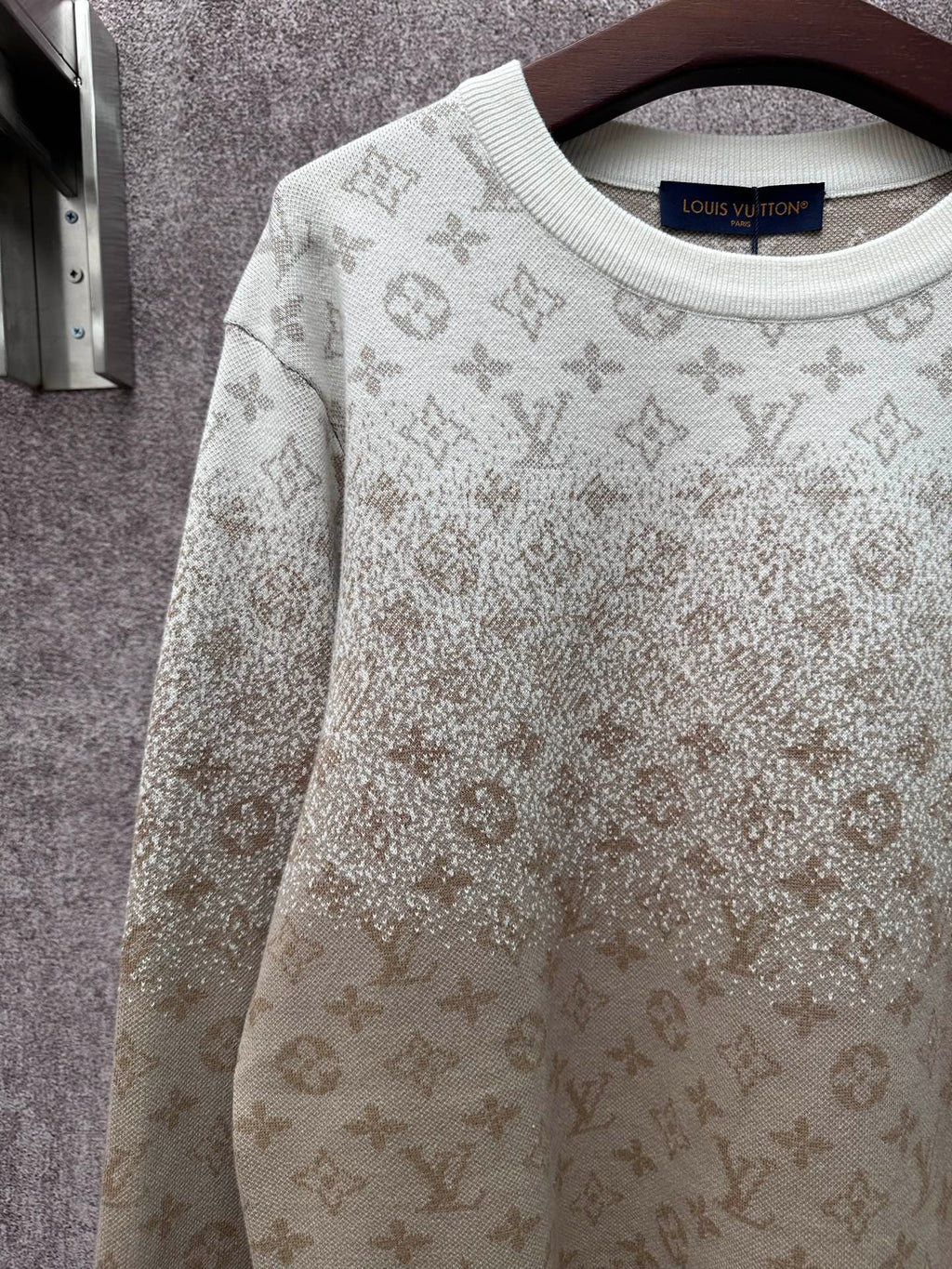 Light beige long-sleeve sweatshirt with allover monogram pattern