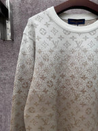 Light beige long-sleeve sweatshirt with allover monogram pattern