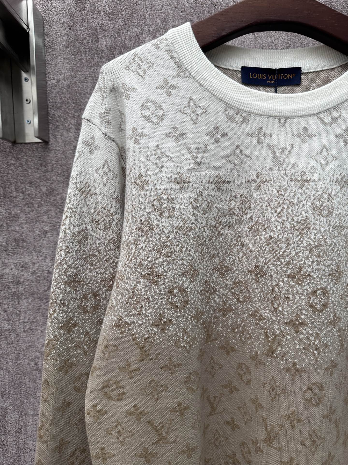 Light beige long-sleeve sweatshirt with allover monogram pattern