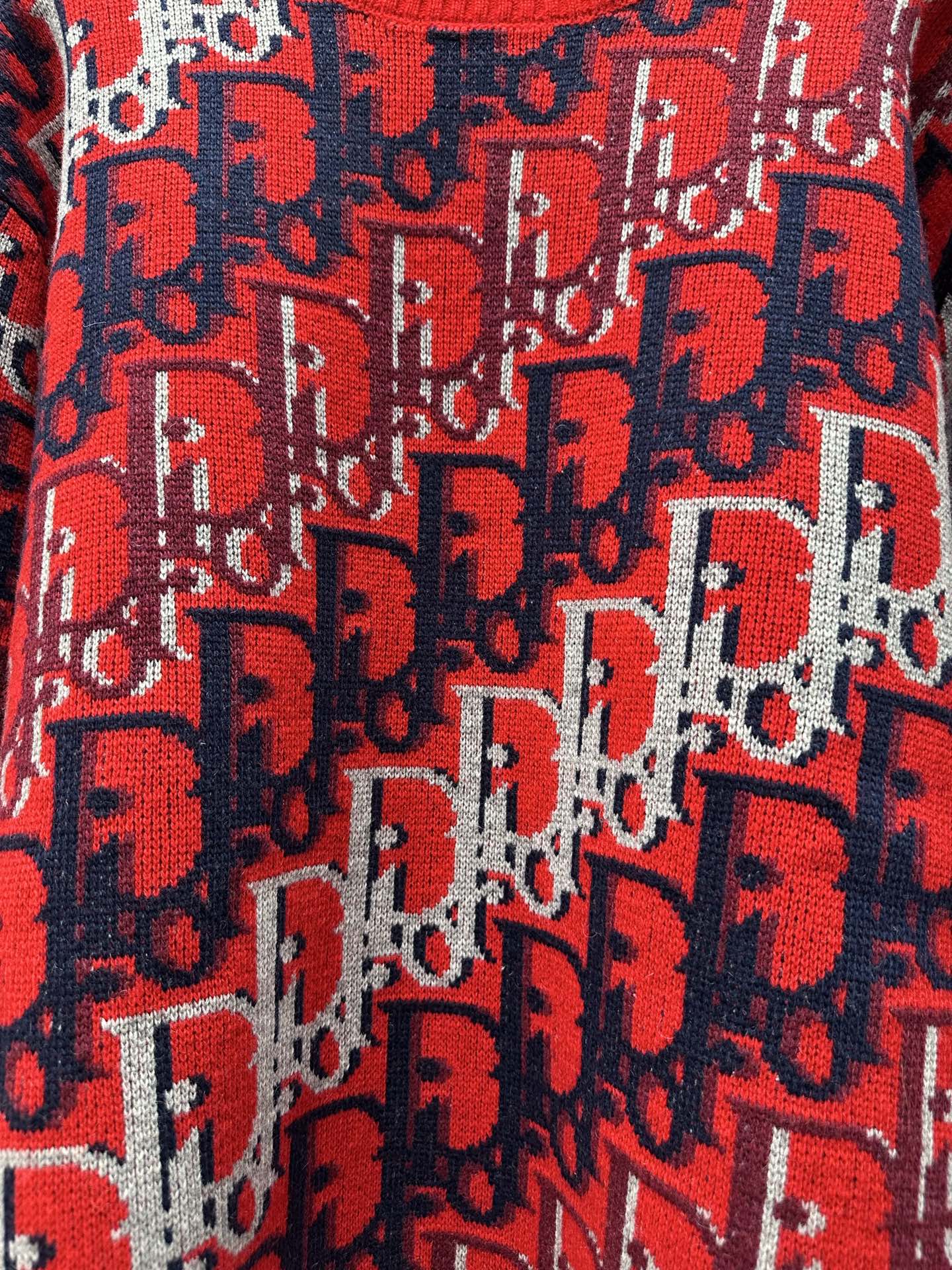 Dior monogram knit fabric, red knit with navy and white repeating motifs