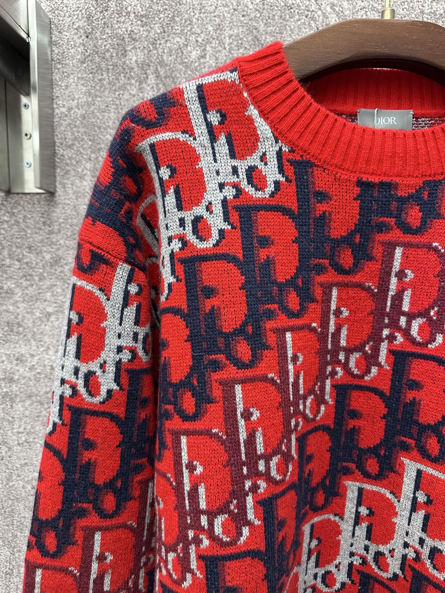 Dior monogram knit sweater sleeve and torso, red with navy and white repeating pattern