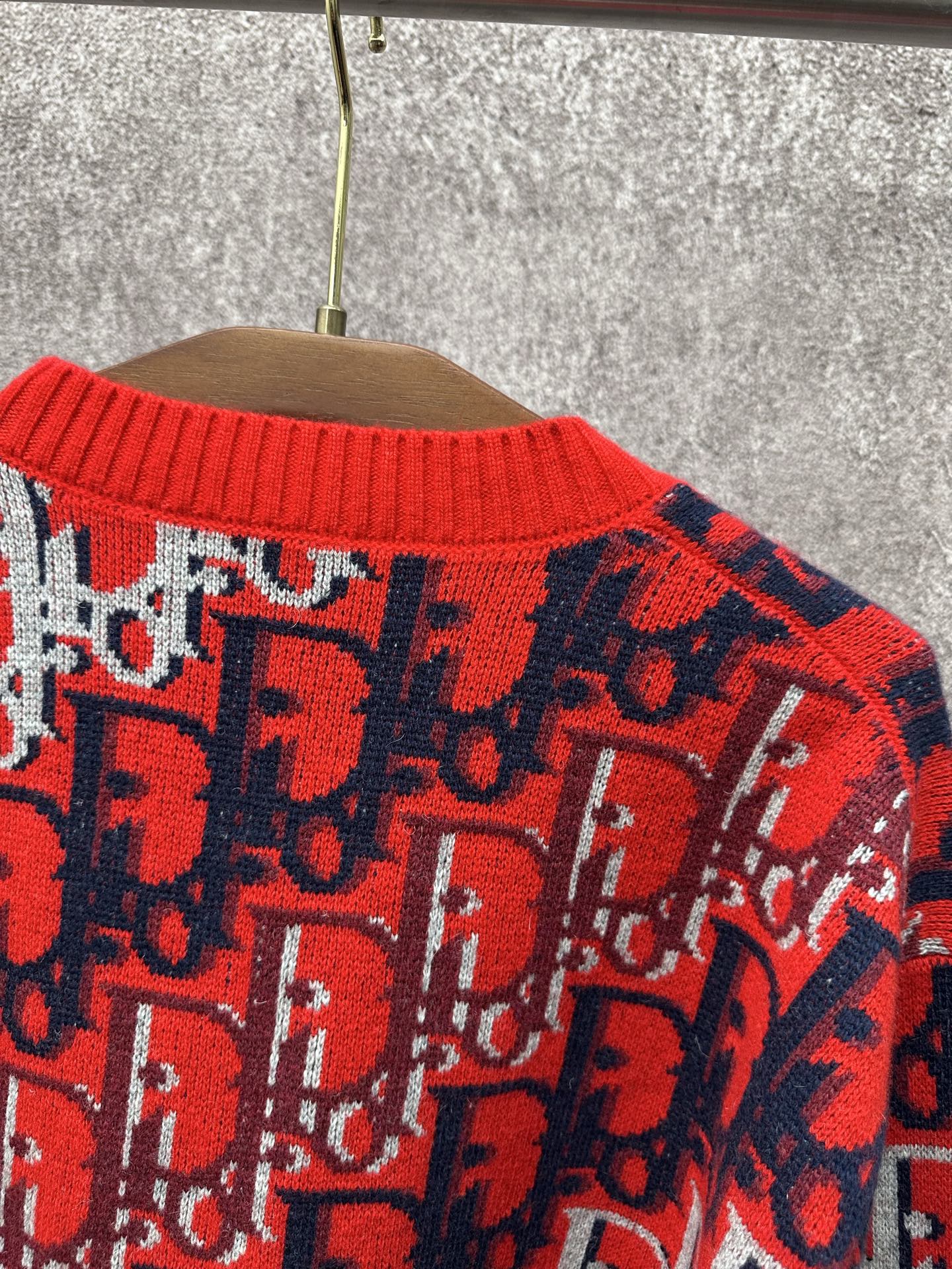 Dior monogram knit sweater neckline, red ribbed collar with navy and white motif
