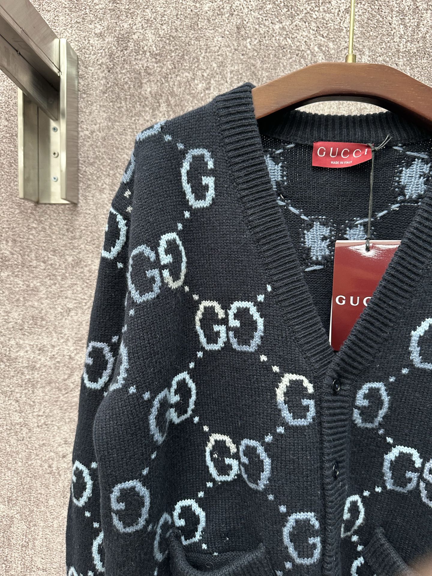 Gucci knit cardigan chest detail with GG pattern and V-neck, dark base