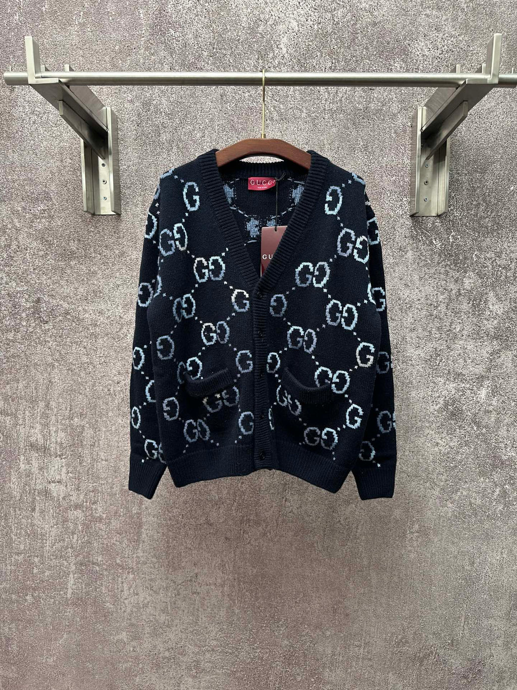 Gucci knit cardigan with GG logo pattern, V-neck and ribbed trim, dark base