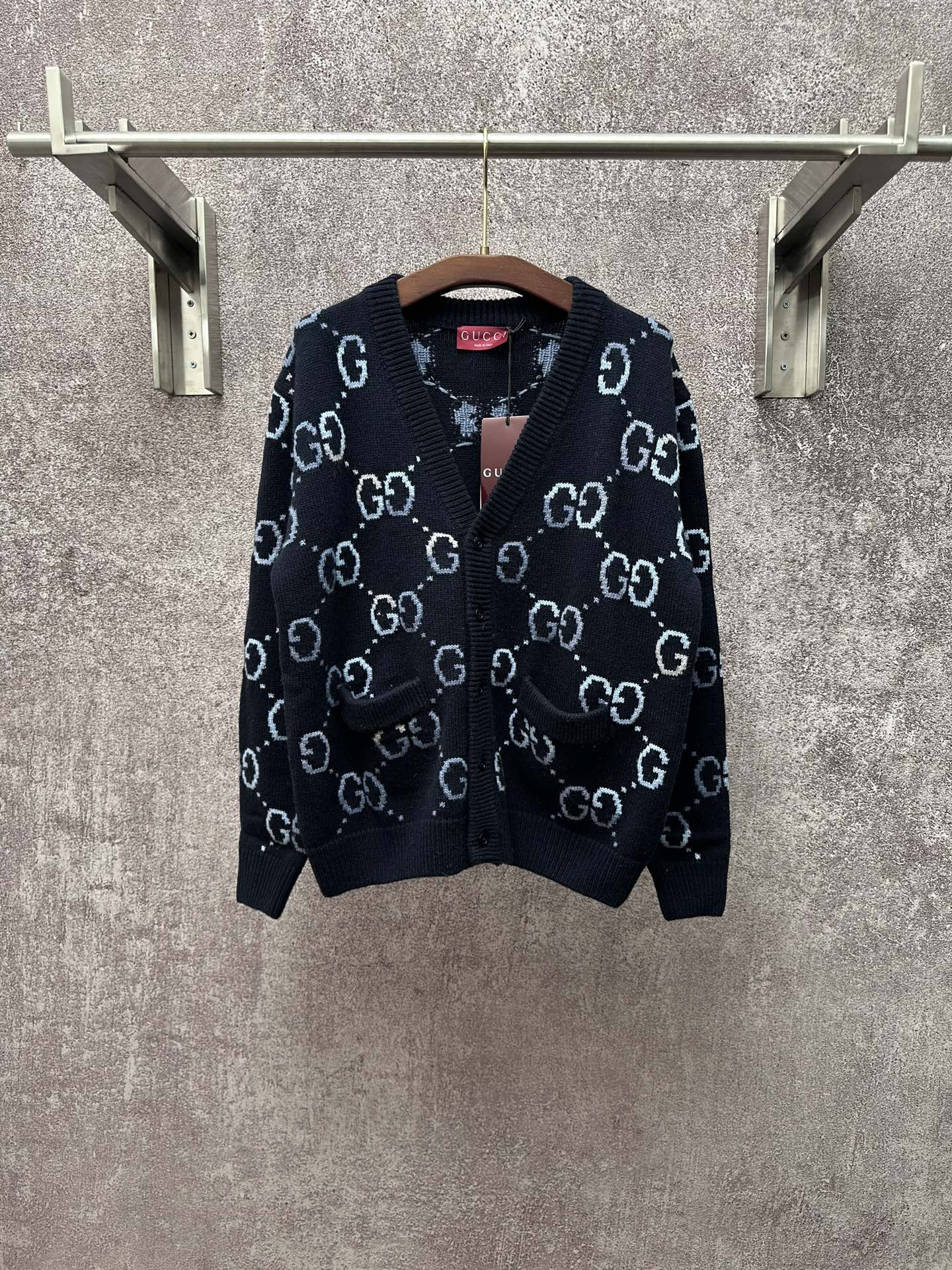 Gucci knit cardigan with GG logo pattern, V-neck and ribbed trim, dark base
