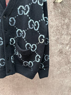 Gucci knit cardigan side hem detail with GG pattern and front pocket, dark knit