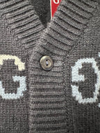 Gucci knit cardigan button placket and collar area, ribbed trim, dark base