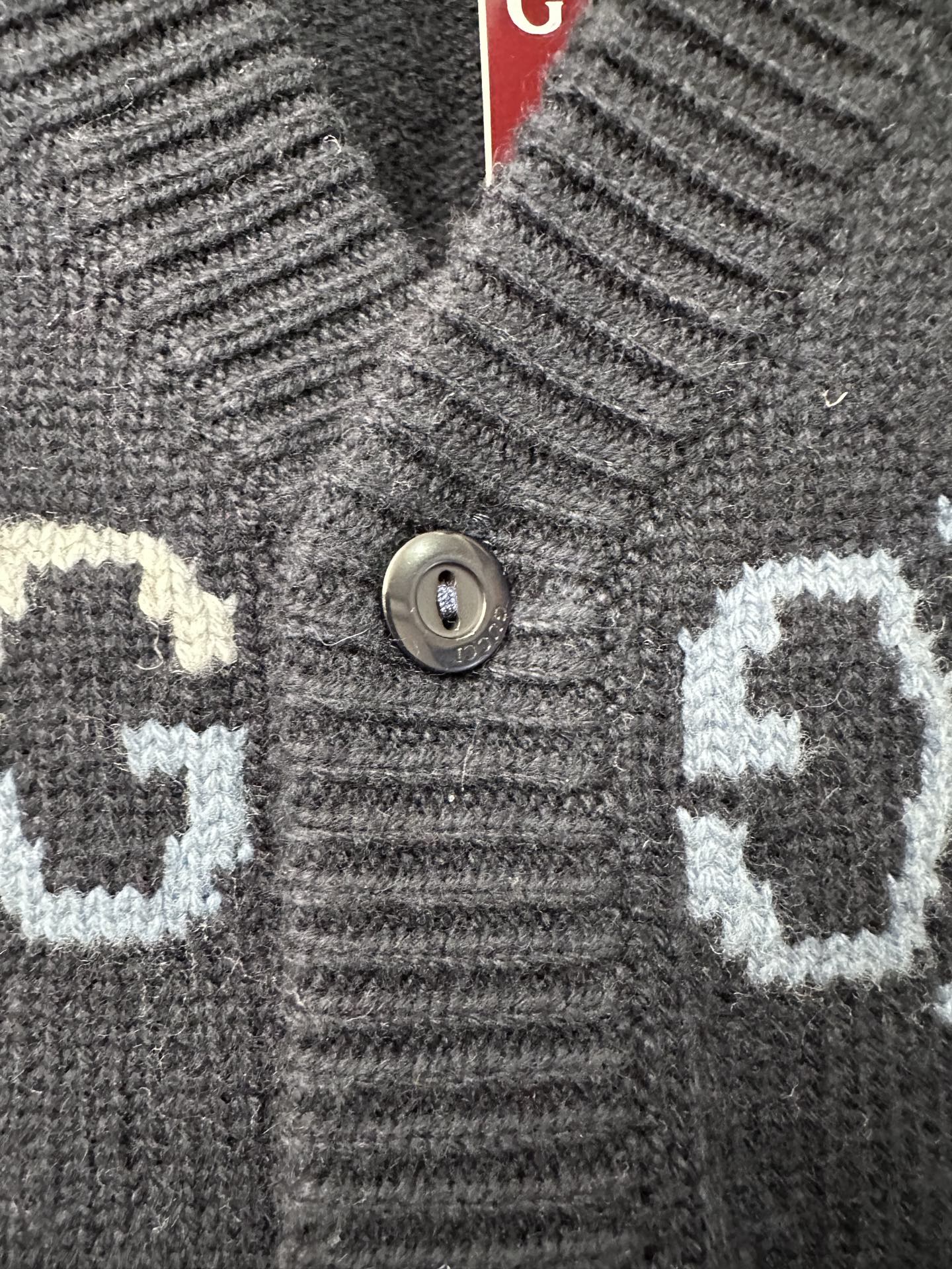 Gucci knit cardigan button placket and collar area, ribbed trim, dark base
