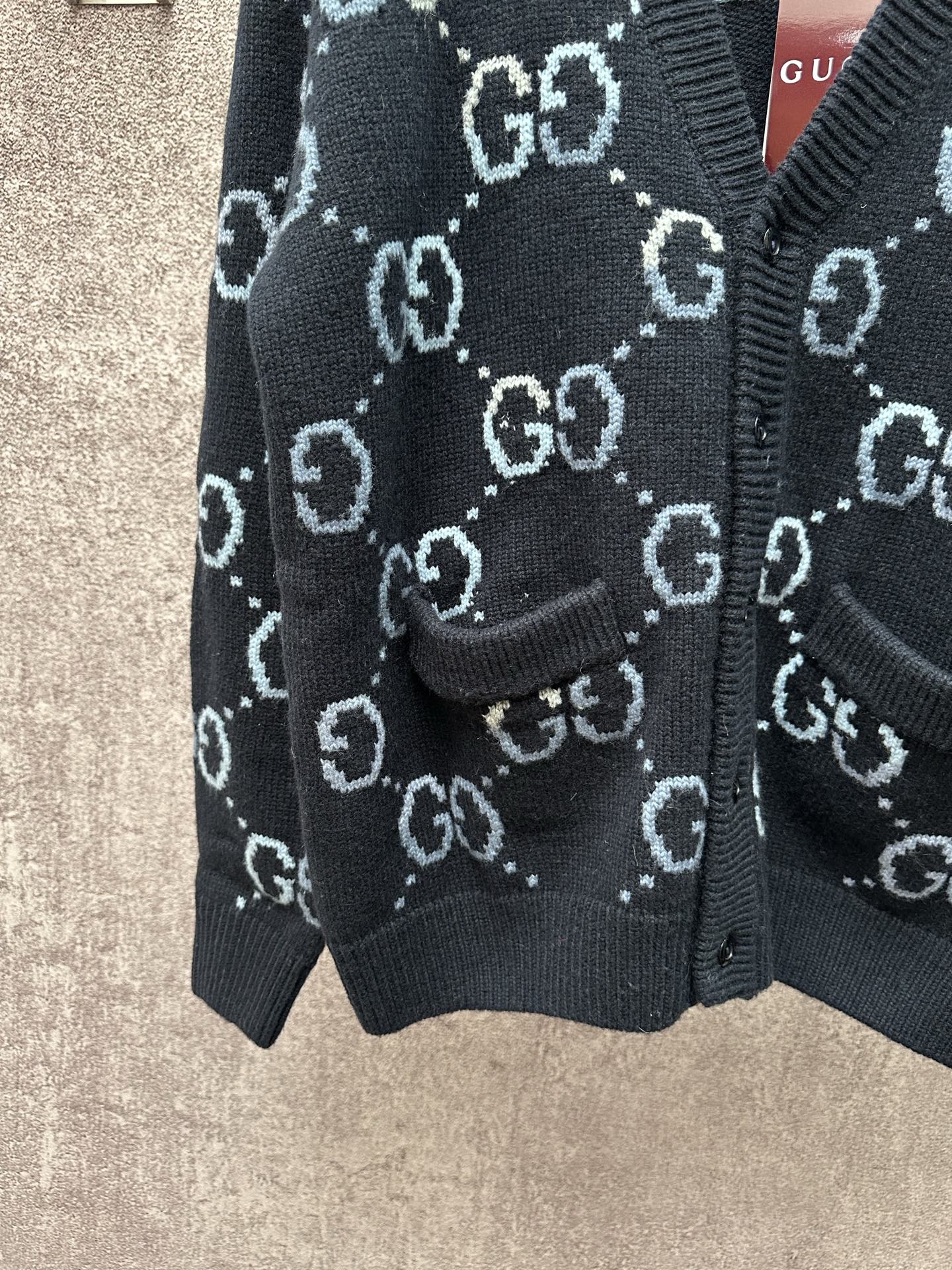 Gucci knit cardigan lower front and ribbed hem with GG pattern, dark base