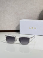 Silver-tone sunglasses with dark lenses and curved metal frame
